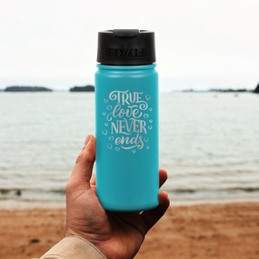 Man holding custom engraved 16 oz water bottle