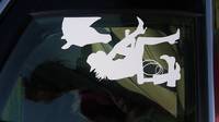 Ashley's photograph of their Cowgirl Putting On Her Boots Next To Her Horse Sticker