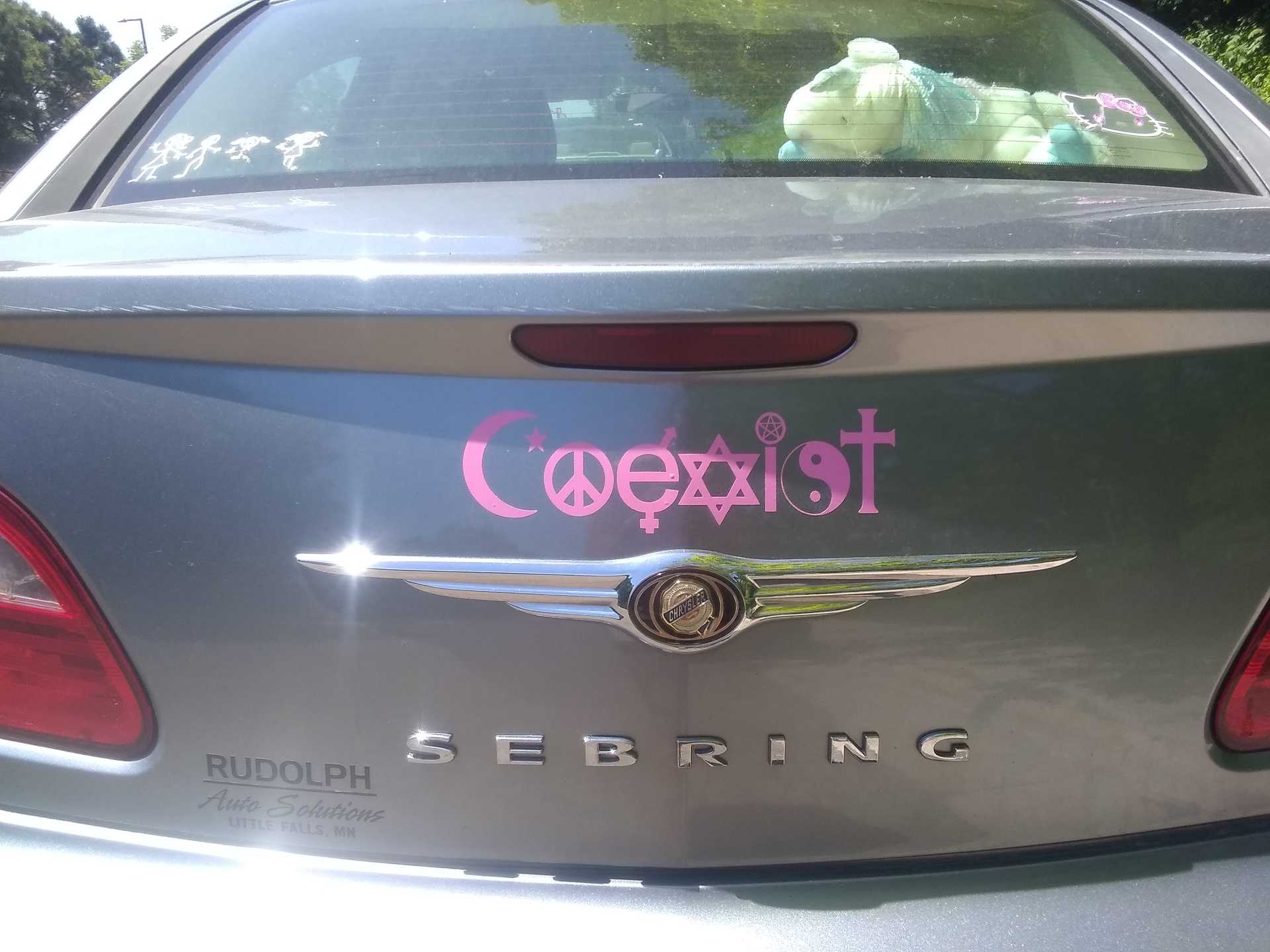 Breanna's photograph of their Coexist Sticker
