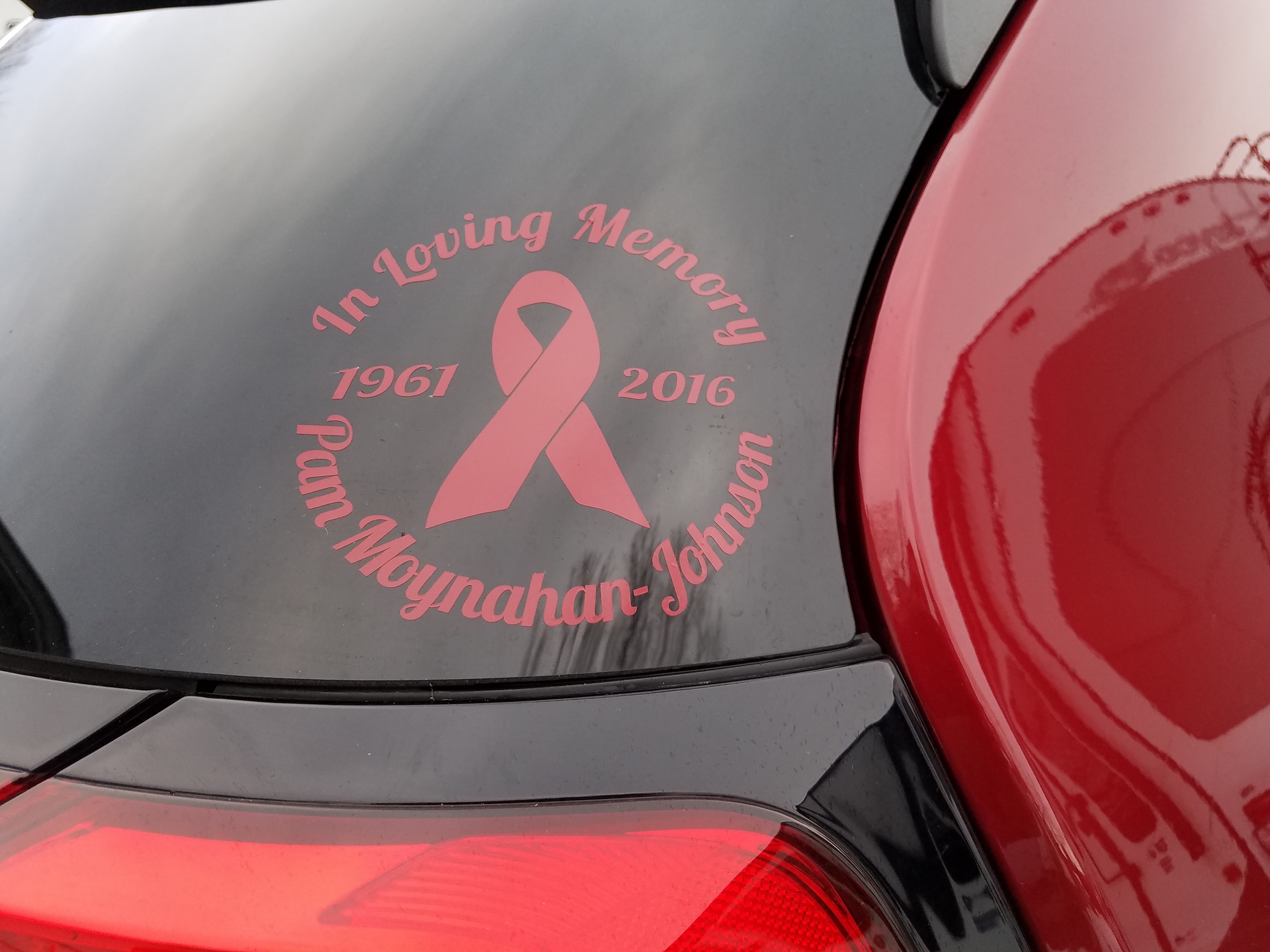 Daniel's photograph of their In Loving Memory Ribbon Sticker