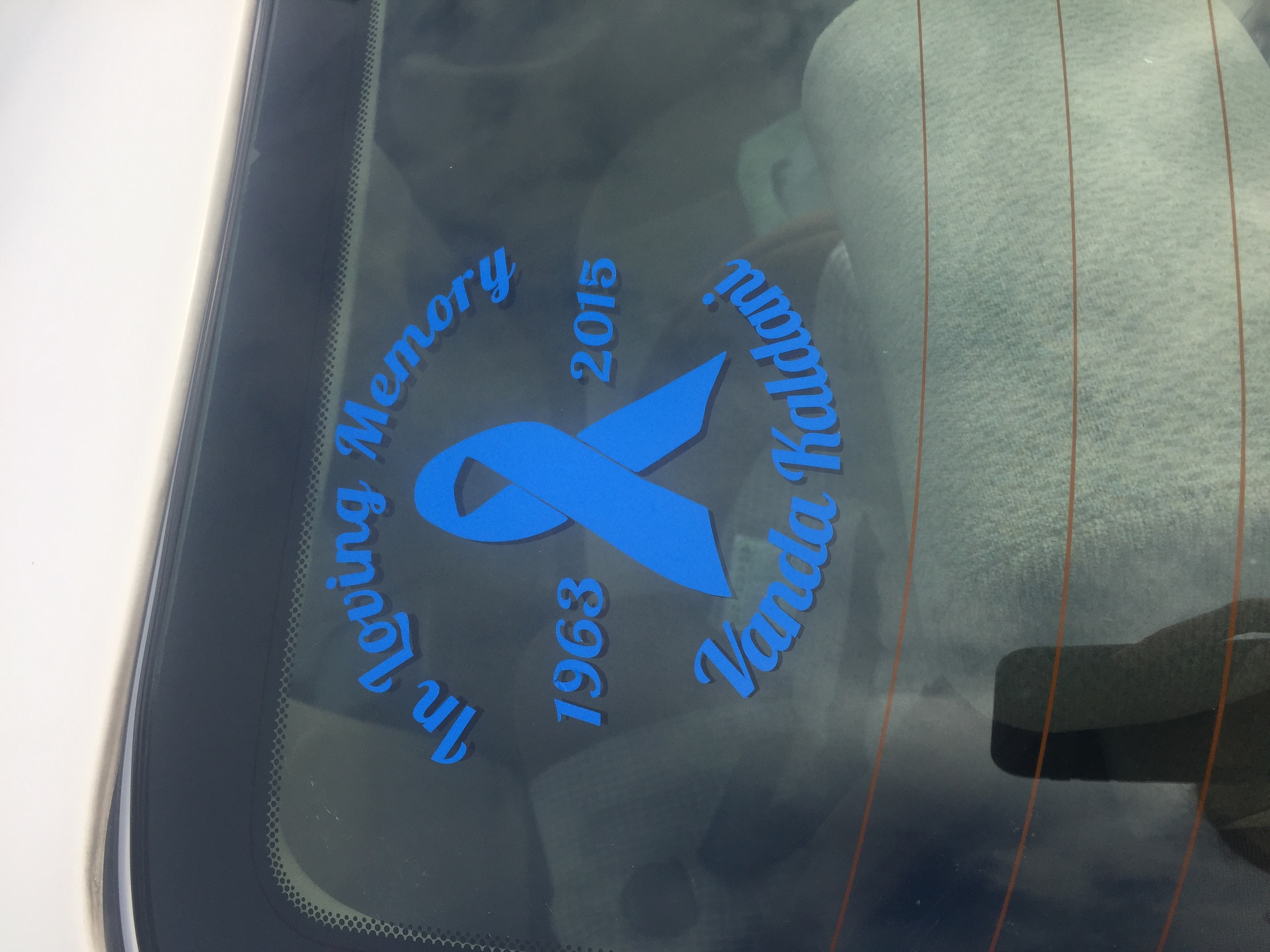 Noor's photograph of their In Loving Memory Ribbon Sticker