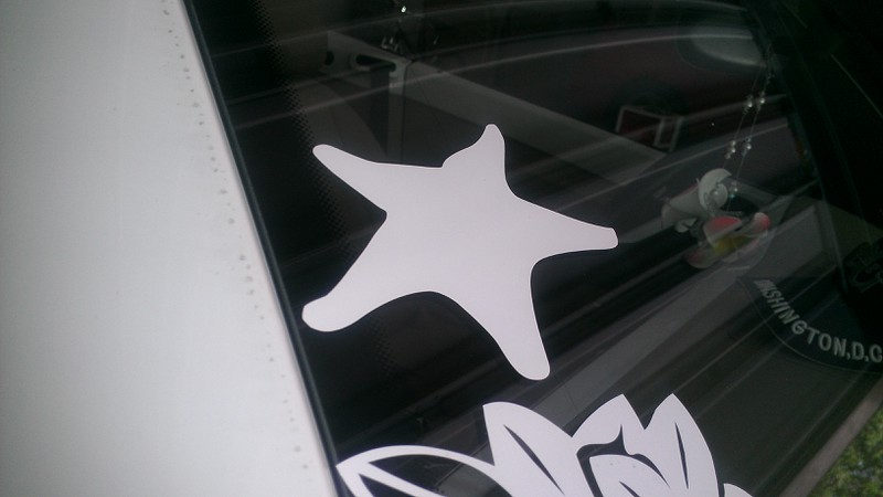 Poseidon's photograph of their Four Starfish Sticker