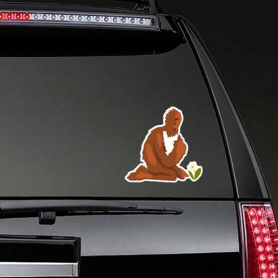 Bigfoot Looking at a Flower Sticker on a Rear Car Window example 