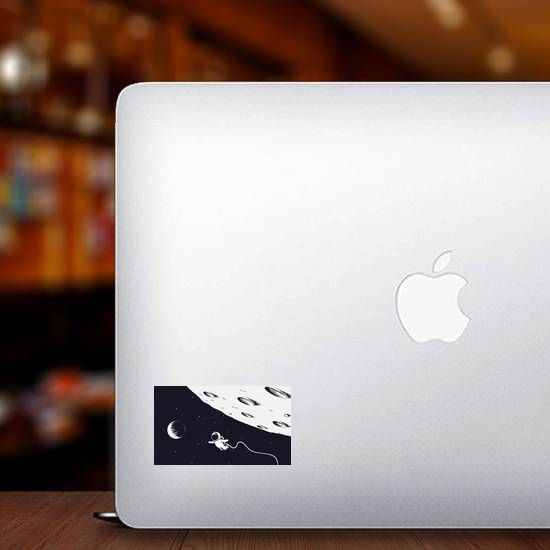 Astronaut Flying Near The Moon Sticker