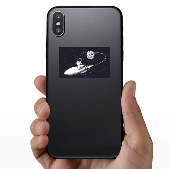 Astronaut Surfing on a Spaceship Sticker