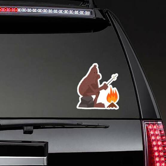 Bigfoot Roasting a Marshmallow Sticker on a Rear Car Window example