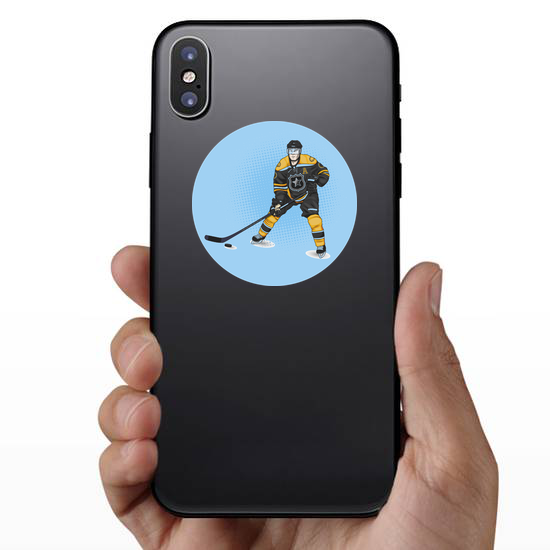 Ice Hockey Player Wearing Yellow Sticker