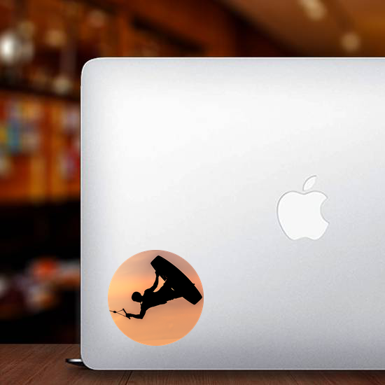 Silhouette Wakeboarder Making Tricks On Sunset Sticker