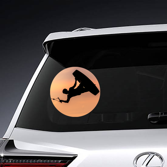 Silhouette Wakeboarder Making Tricks On Sunset Sticker