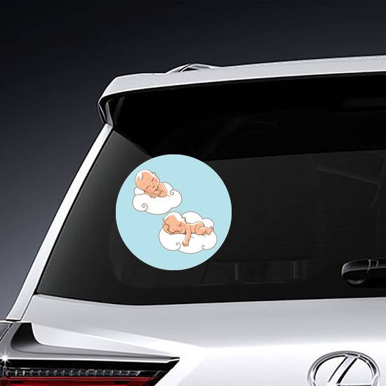Two Babies Sleeping on Clouds Sticker example