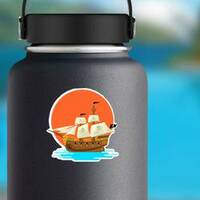 Pirate Ship at Sunset Sticker on a Water Bottle example