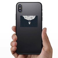 Astronaut Swinging On The Moon Sticker