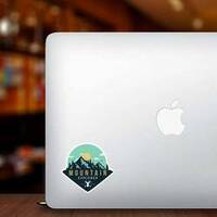 Deer Mountain Explorer Sticker on a Laptop example