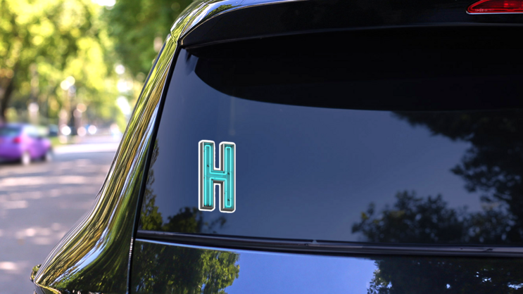 3D Neon Letter H Sticker on a Rear Car Window (New) example
