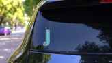 3D Neon Letter J Sticker on a Rear Car Window (New) example