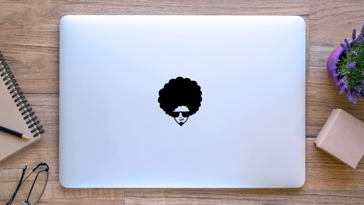 70s Man Face With Frizzy Hair Sticker on a Laptop (New) example