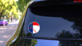A Baseball With The North Carolina State Flag Sticker on a Rear Car Window (New) example