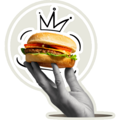 A Hand Holds A Burger King Sticker