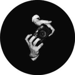 A Man Photographer Holding A Camera In Black Sticker