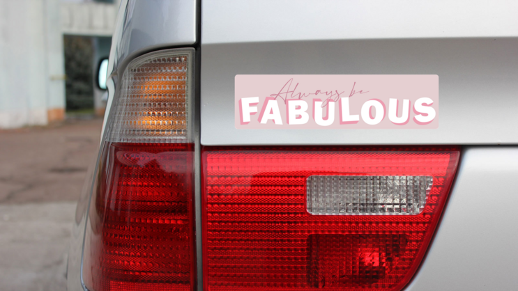 Absolutely Fabulous Bumper Sticker on a Gold Car Rear Bumper example