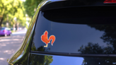 Abstract Red Rooster Decorative Sticker on a Rear Car Window (New) example