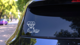 Adorable Dog With Food Bowl Sticker on a Rear Car Window (New) example