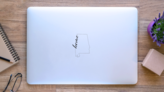 Alabama State Map Outline With Lettering Sticker on a Laptop (New) example