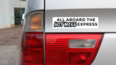 All Aboard The Hot Mess Express Bumper Sticker on a Gold Car Rear Bumper example