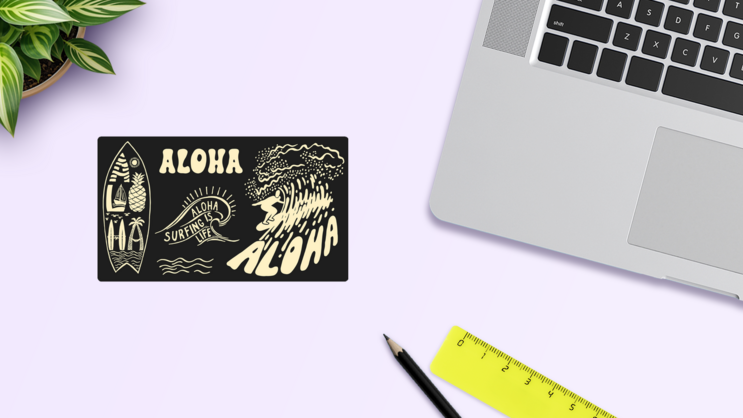 Aloha Surfing Sticker Sheet on a Desk (New) example