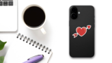 Amour Symbol With Heart And Arrow Icon Sticker on a Phone (New) example