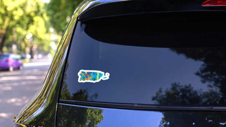 An Illustration Of A Colourfully Filled Outline Of Puerto Rico Sticker on a Rear Car Window (New) example