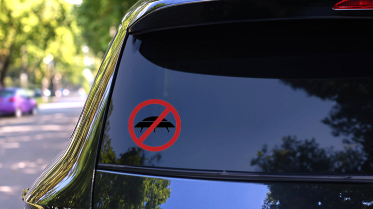Anti Spaceship Sign Sticker on a Rear Car Window (New) example