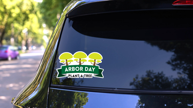 Arbor Day Plant A Tree Green Ribbon Sticker on a Rear Car Window (New) example