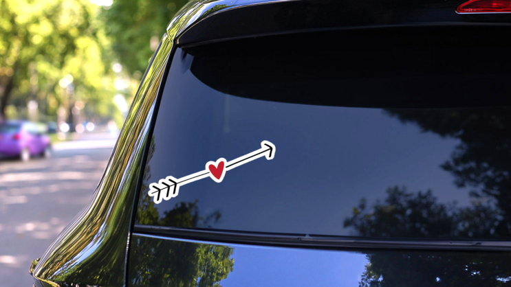 Arrow With Mini Heart In The Middle Sticker on a Rear Car Window (New) example