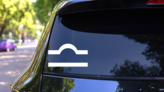 Astrology - Libra Zodiac Symbol Sticker on a Rear Car Window (New) example