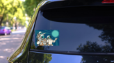 Astronaut Family Sticker on a Rear Car Window (New) example