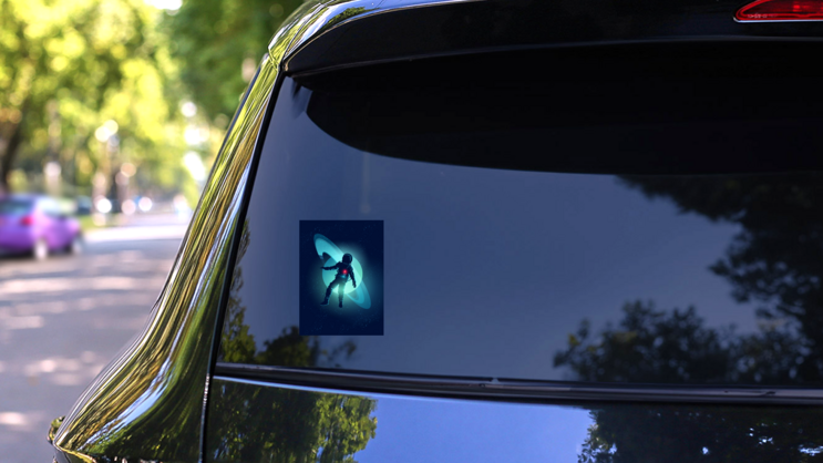 Astronaut Floating Through Space Sticker on a Rear Car Window (New) example