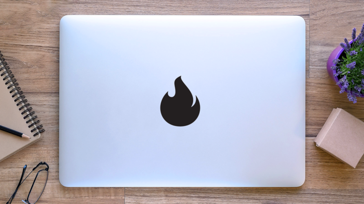 Baby Flame Sticker on a Laptop (New) example