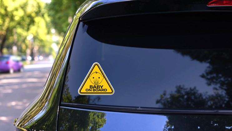 Baby on Board Triangle Sticker on a Rear Car Window (New) example
