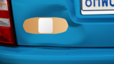 Band Aid Bandage Upside Down Sticker on a Dented Car example