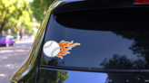 Baseball With Short Flames Sticker on a Rear Car Window (New) example