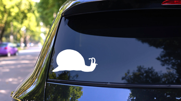 Basic Snail Silhouette Sticker on a Rear Car Window (New) example