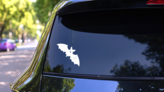 Bat With An Evil Smile Sticker on a Rear Car Window (New) example