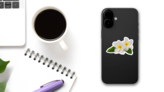 Beautiful White Plumeria Rubra Flowers Sticker on a Phone (New) example