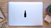 Beer Bottle Icon Sticker on a Laptop (New) example