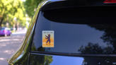 Berlin Germany Vintage Poster In Orange And Blue Sticker on a Rear Car Window (New) example