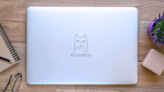 Best Cat Mom Ever Lettering Middle Finger Sticker on a Laptop (New) example