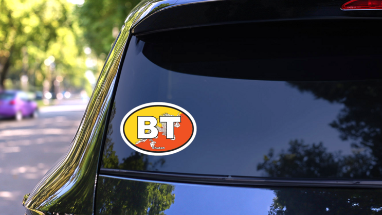 Bhutan BT Flag Oval Sticker on a Rear Car Window (New) example