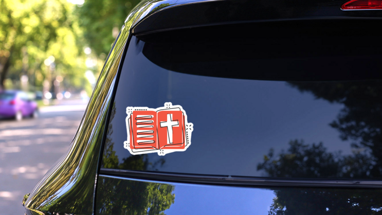 Bible Book Icon In Comic Style Sticker on a Rear Car Window (New) example
