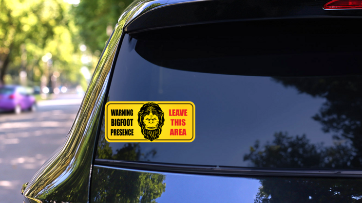 Bigfoot Presence Sign Sticker on a Rear Car Window (New) example